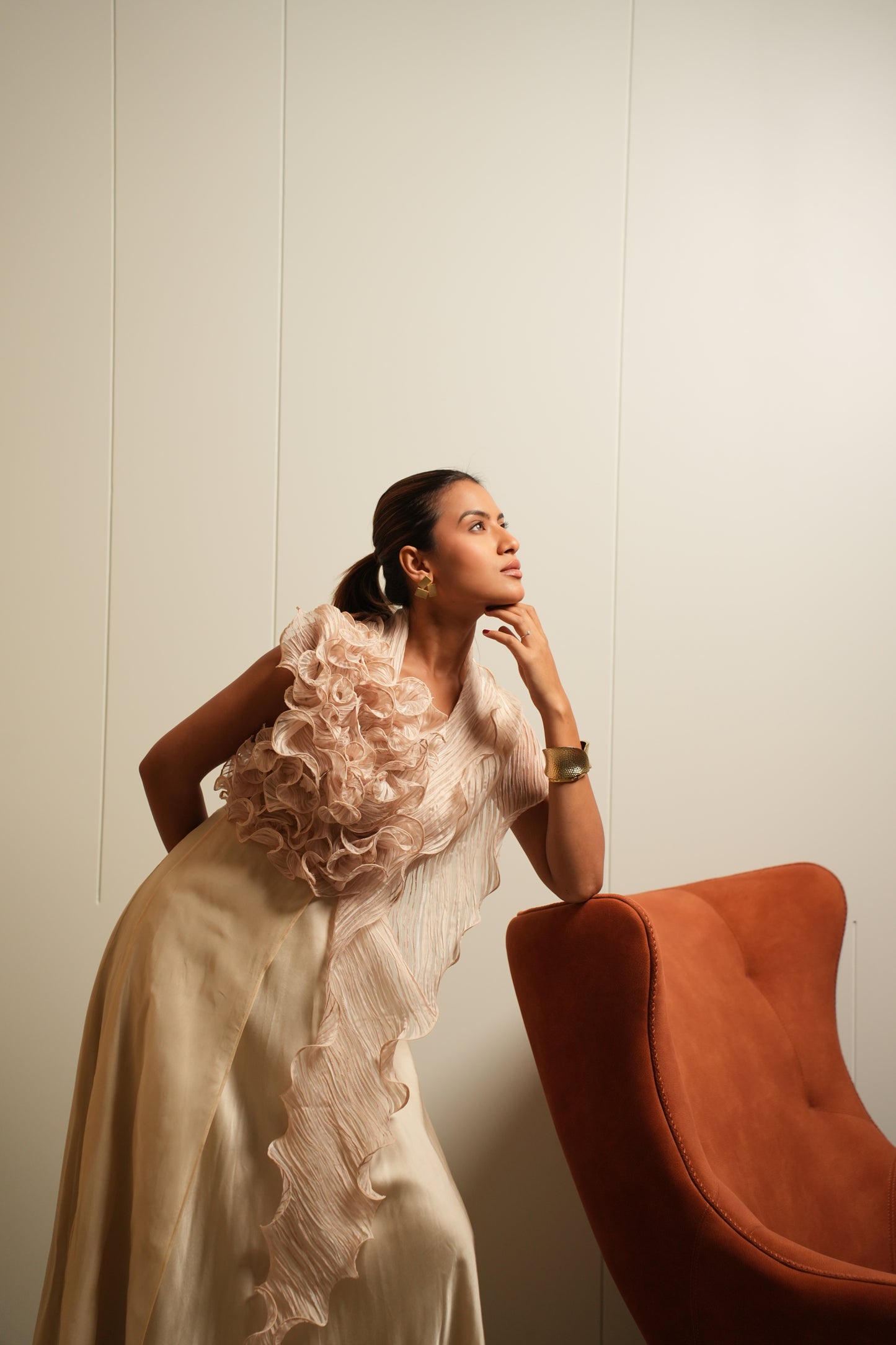 Beige sculpted ruffle drape gown