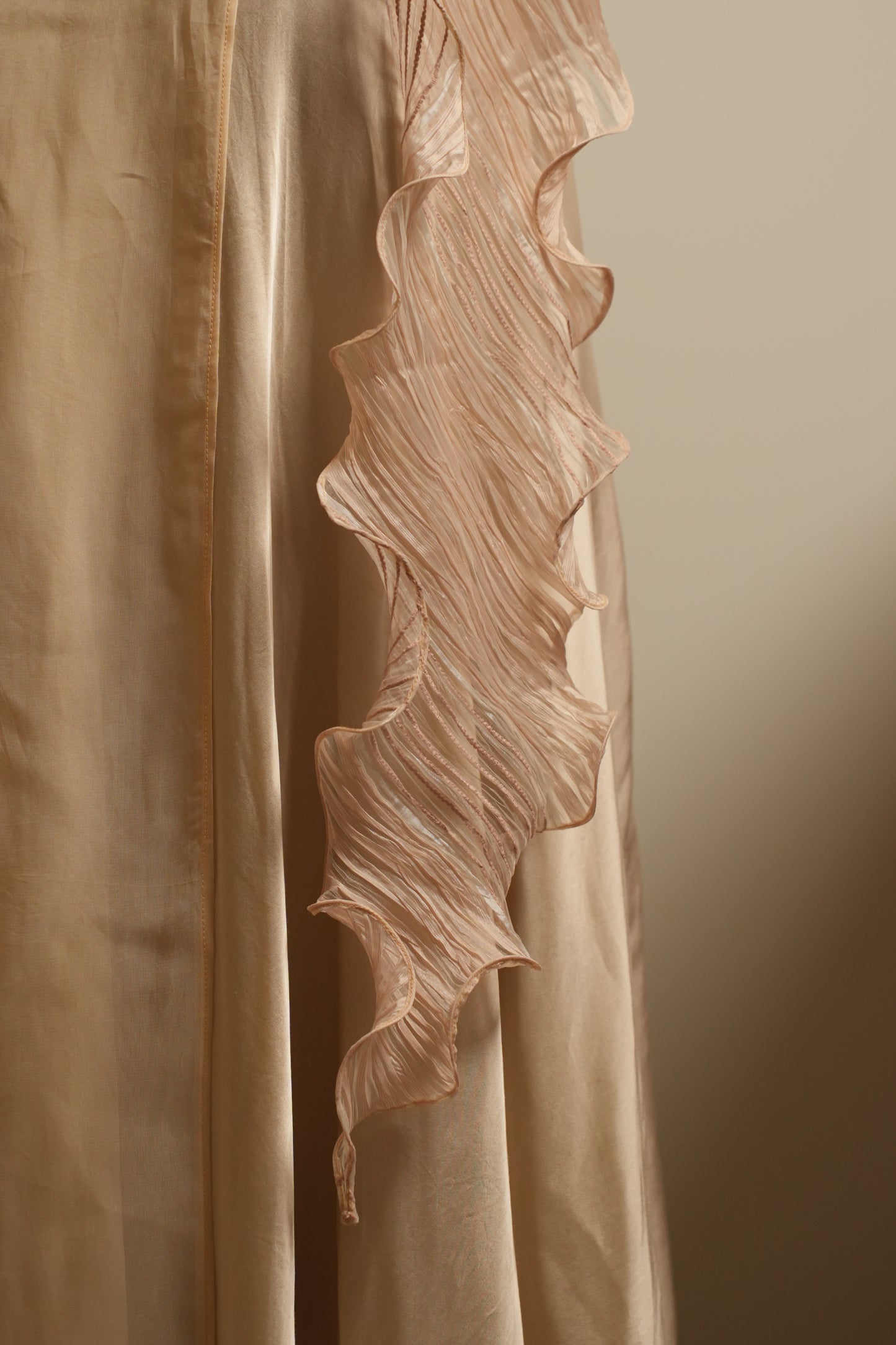Beige sculpted ruffle drape gown