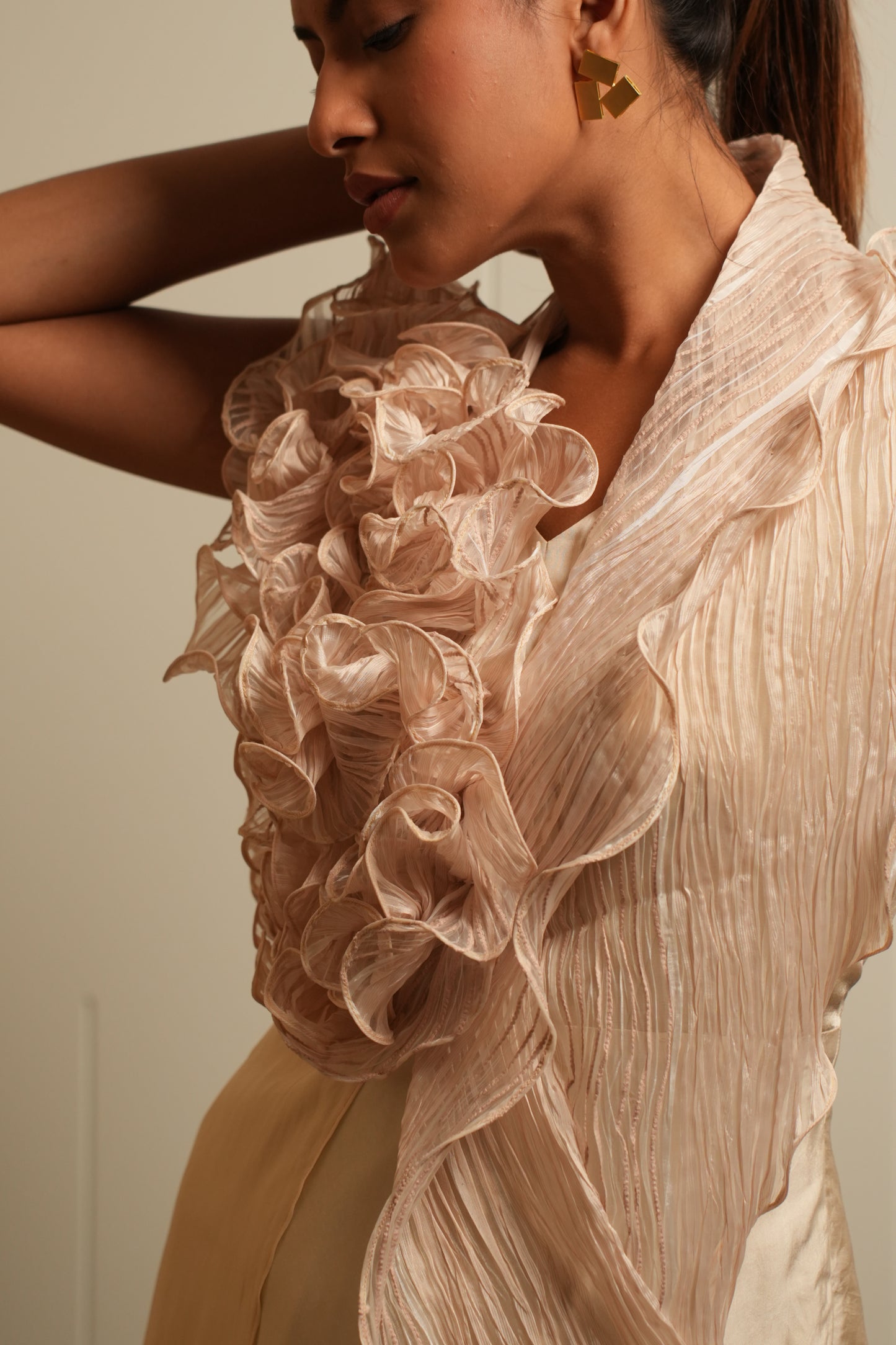 Beige sculpted ruffle drape gown